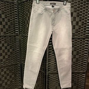 Soft Grey White House Black Market Jeans Size 8R. Rhinestones on pockets.